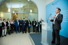 Thorsten Herdan, Leiter der Abteilung Energiepolitik - Wärme und Energieeffizienz - im BMWi, eröffnet die Veranstaltung